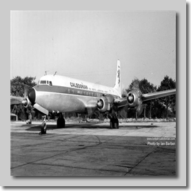 Cally DC-7C G-AOIE on ground runs, ACE Archer at the controls